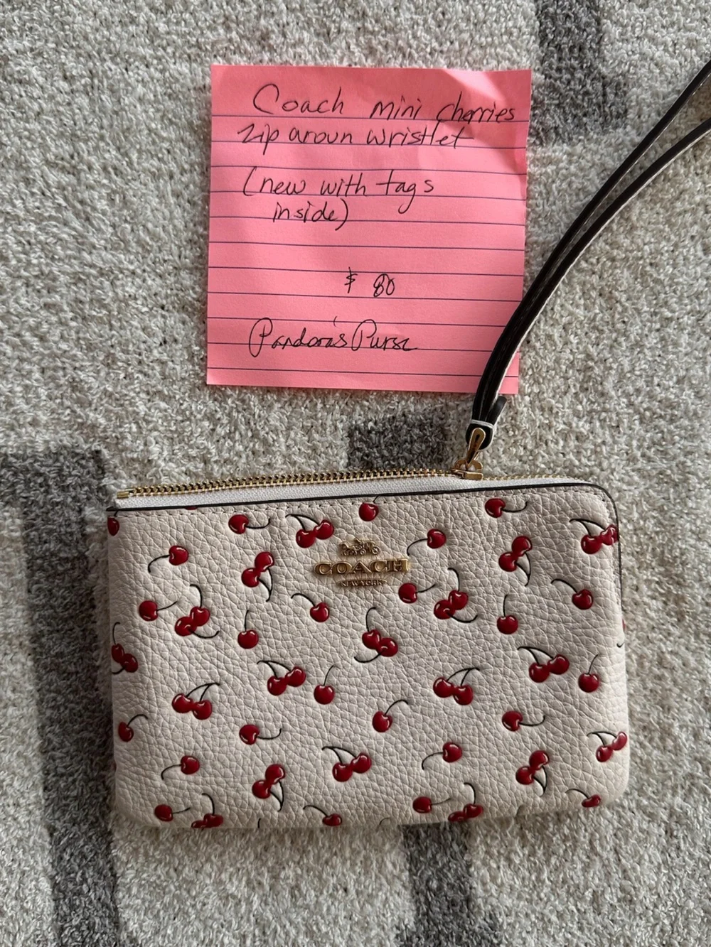 COACH Cream Leather Wristlet with Red Cherry Print